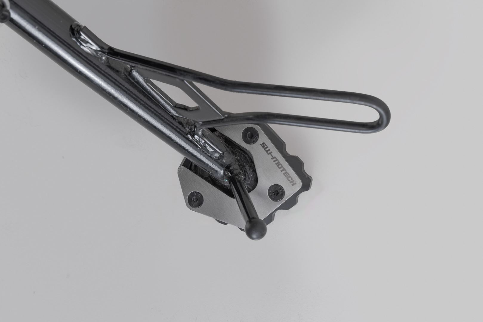 Extension for side stand foot Black/Silver. Moto Guzzi V85 TT (24-).